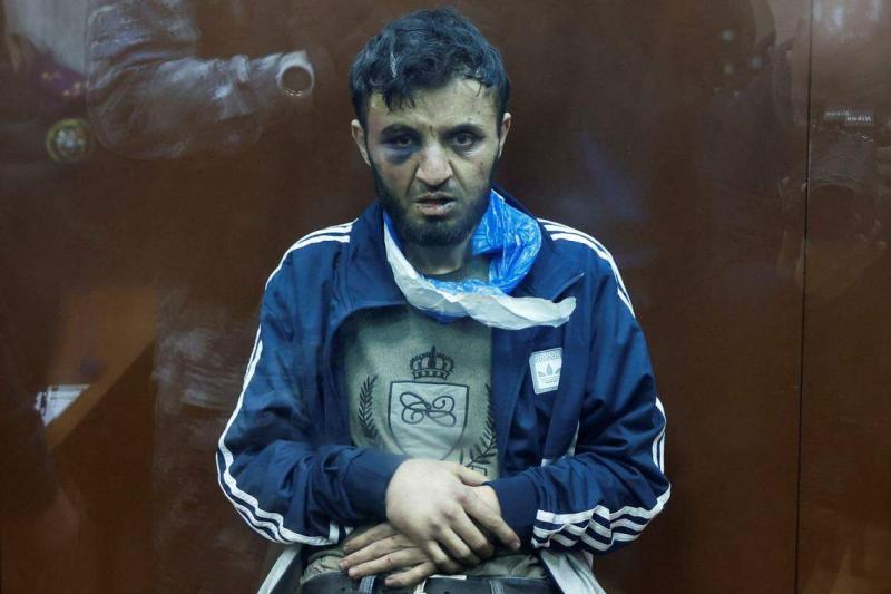 直接参与莫斯科音乐厅袭击的四名嫌犯分别出庭面控,他们的脸部都有明显淤青和伤势,图为嫌犯之一米尔佐耶夫,他已经认罪。(路透社)