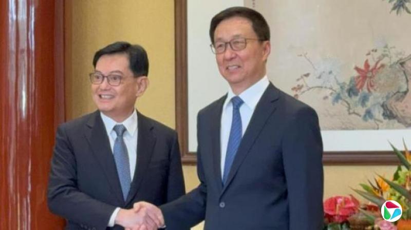 王瑞杰韩正老朋友见面 说得起劲忘了翻译