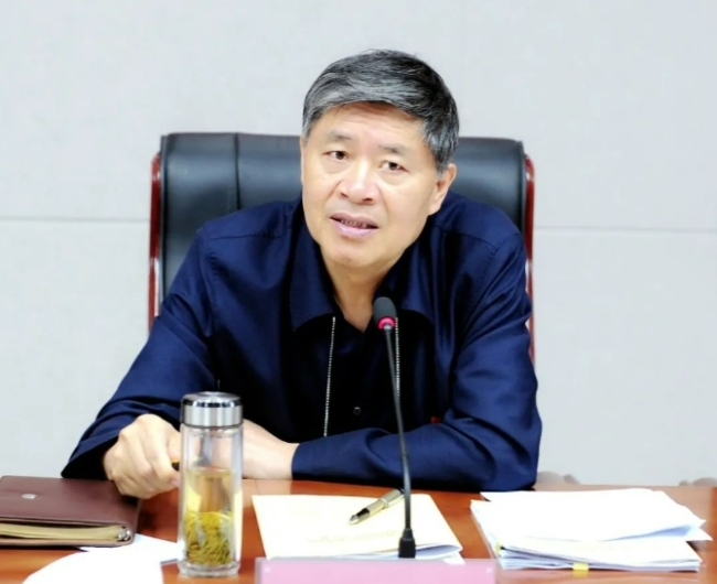 曾昭宝,主动投案