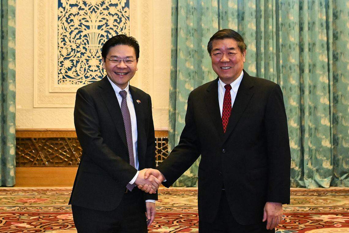 副总理兼财政部长黄循财星期三(12月6日)在北京和中共政治局委员、中国国务院副总理何立峰会面。(海峡时报)