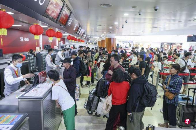 海南岛回程一票难求 中国民航局增加海南运力