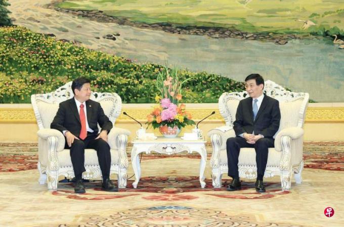 王沪宁会见傅崐萁 称一家人应该常来常往