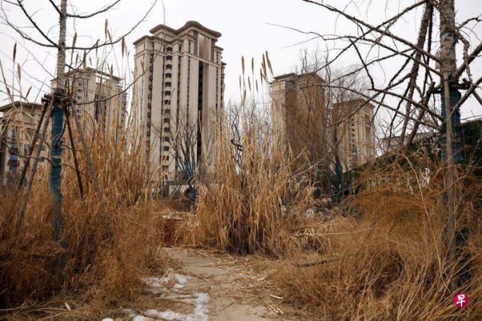 全球两大信评机构大幅下调中国房地产销售预估