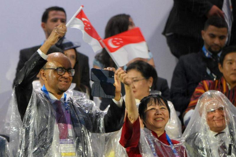 尚达曼总统伉俪也出席了奥运开幕式。(海峡时报)