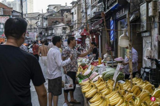 中国计划用五年将常住人口城镇化率提升至70%