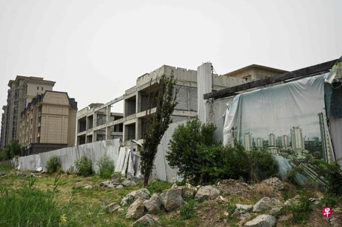 中国首例 南京一烂尾楼在政府协调下可退房退首付