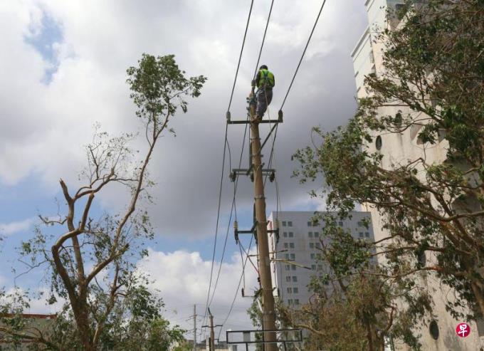 海南居民生活逐渐恢复正常 电力网络渐通
