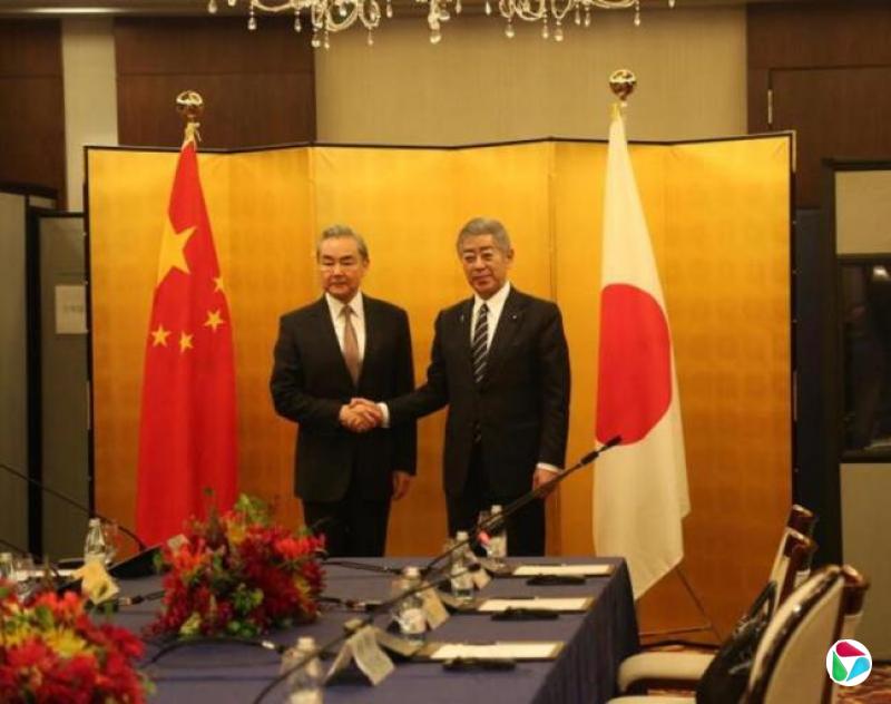 中日时隔六年举行经济高层对话 王毅吁双方对问题分歧做“减法”