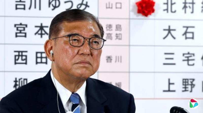 在投票结束后的几个小时里,石破茂在政党的东京总部回答记者问题。