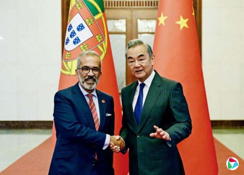 王毅:中葡妥善解决澳门问题树立和平解决争端典范