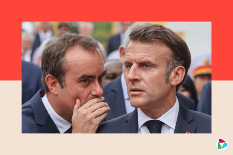 法国总统马克龙(右)与勒科尔尼(左)交谈。