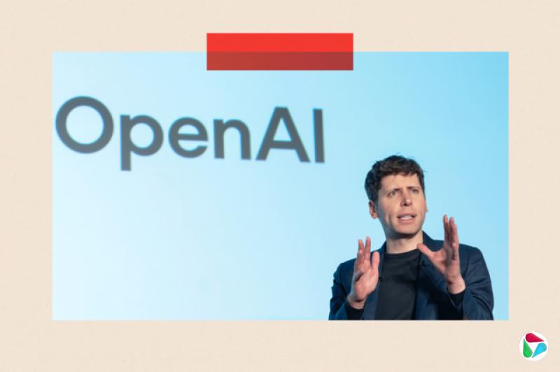 萨姆·阿特曼站在“OpenAI”标志前发言。